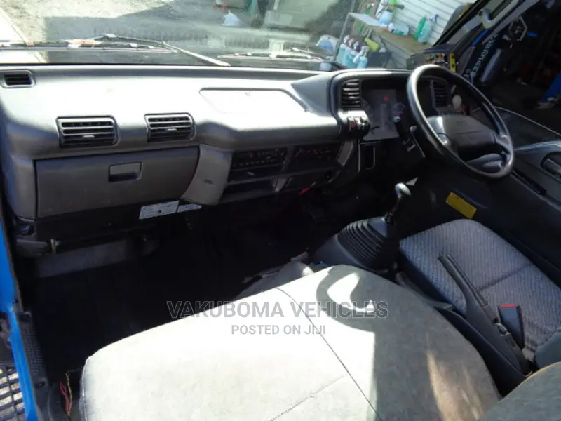 Isuzu Elf Garbage Truck