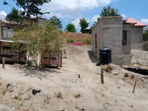 Kiwanja Chenye Nyumba