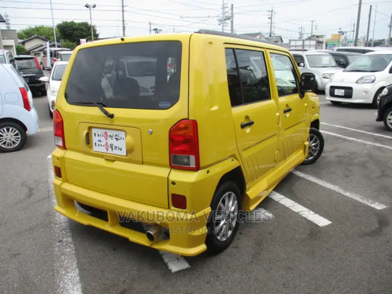 Daihatsu Mira 2003 Yellow