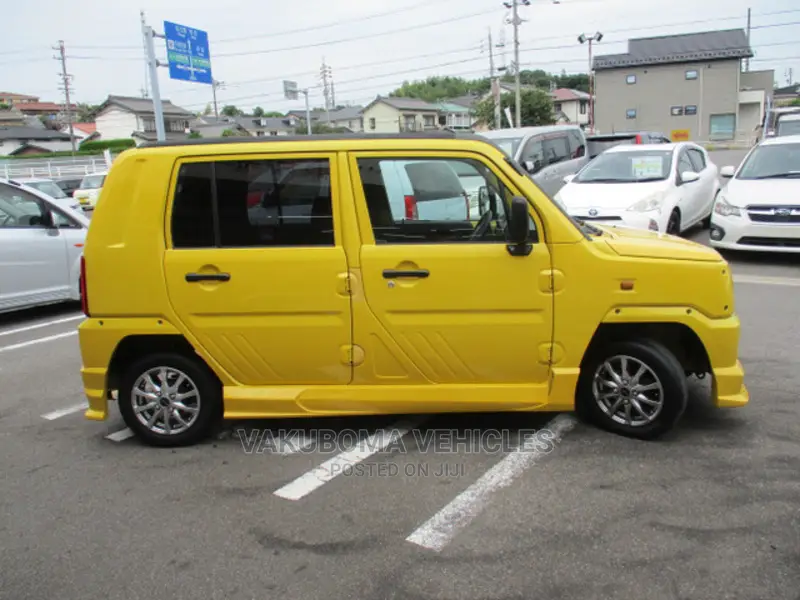 Daihatsu Mira 2003 Yellow