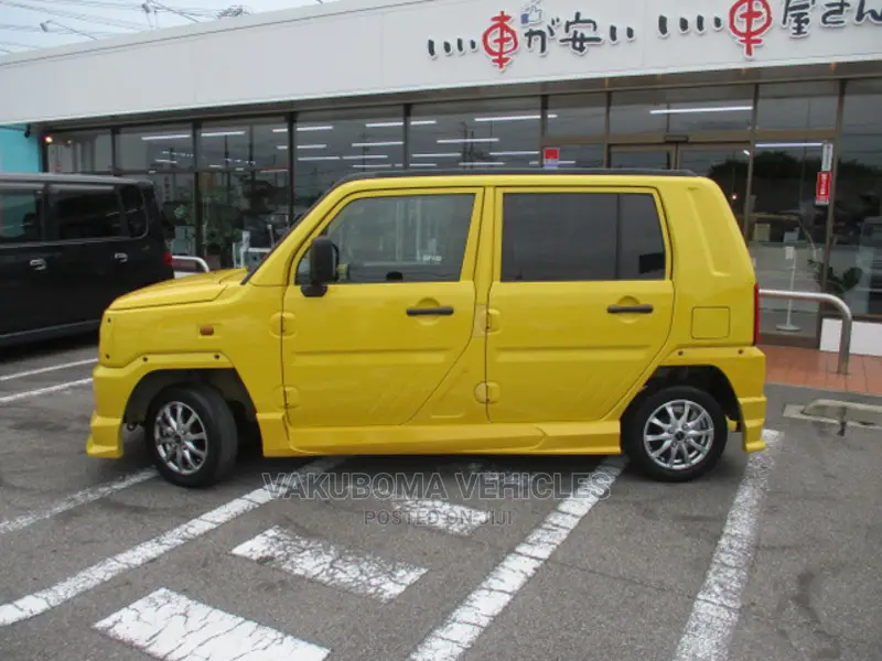 Daihatsu Mira 2003 Yellow
