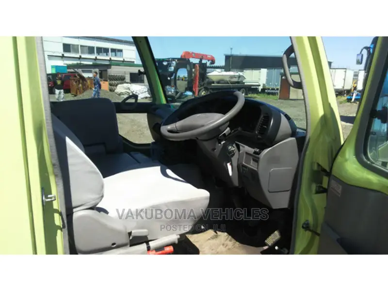 Toyota Coaster 2006 Yellow