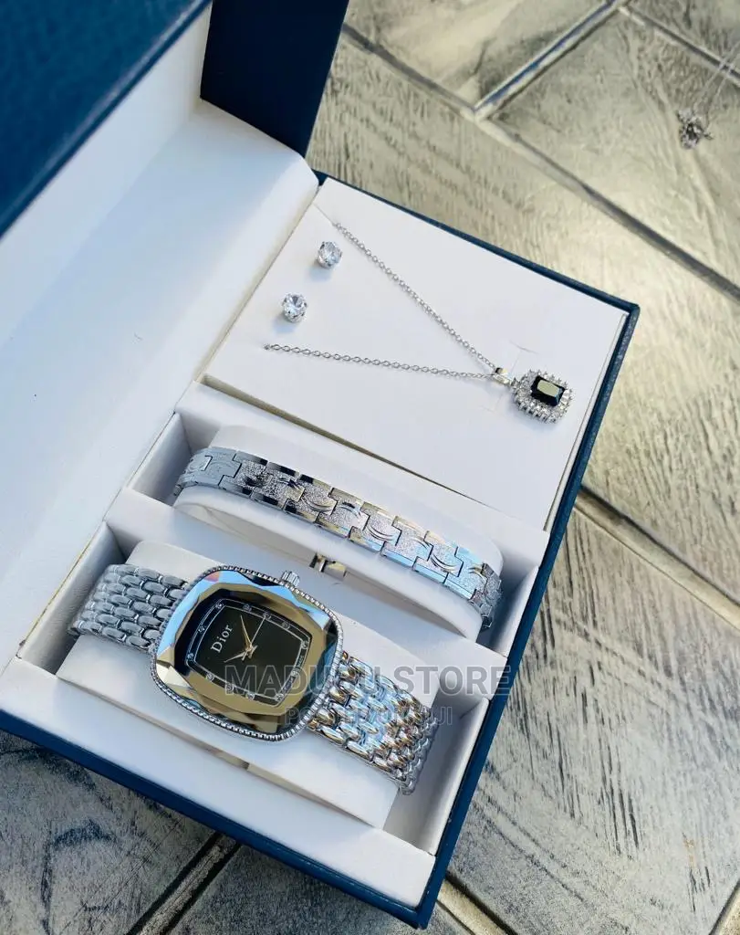 A Set of Watch, Bracelet, Earrings and Necklace