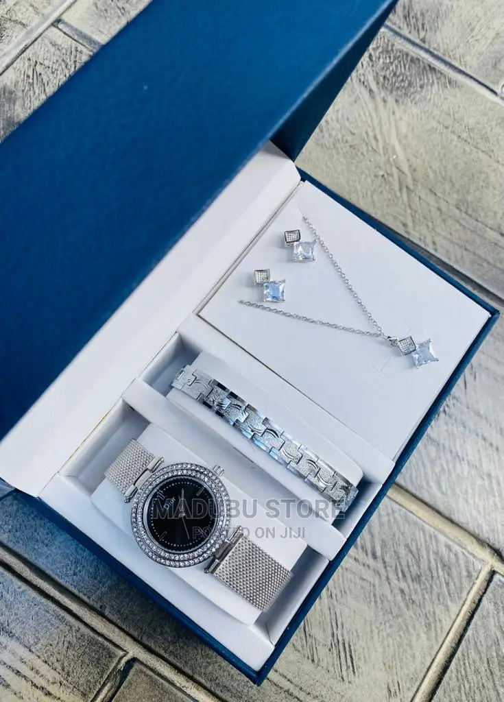 A Set of Watch, Bracelet, Earrings and Necklace