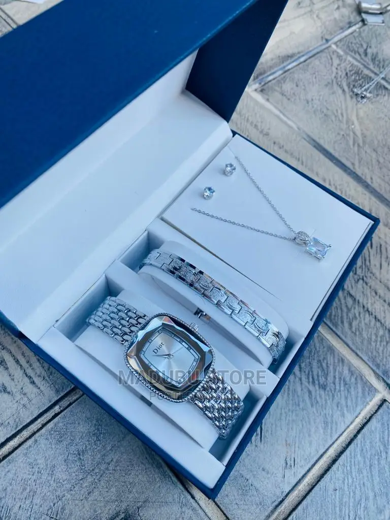 A Set of Watch, Bracelet, Earrings and Necklace