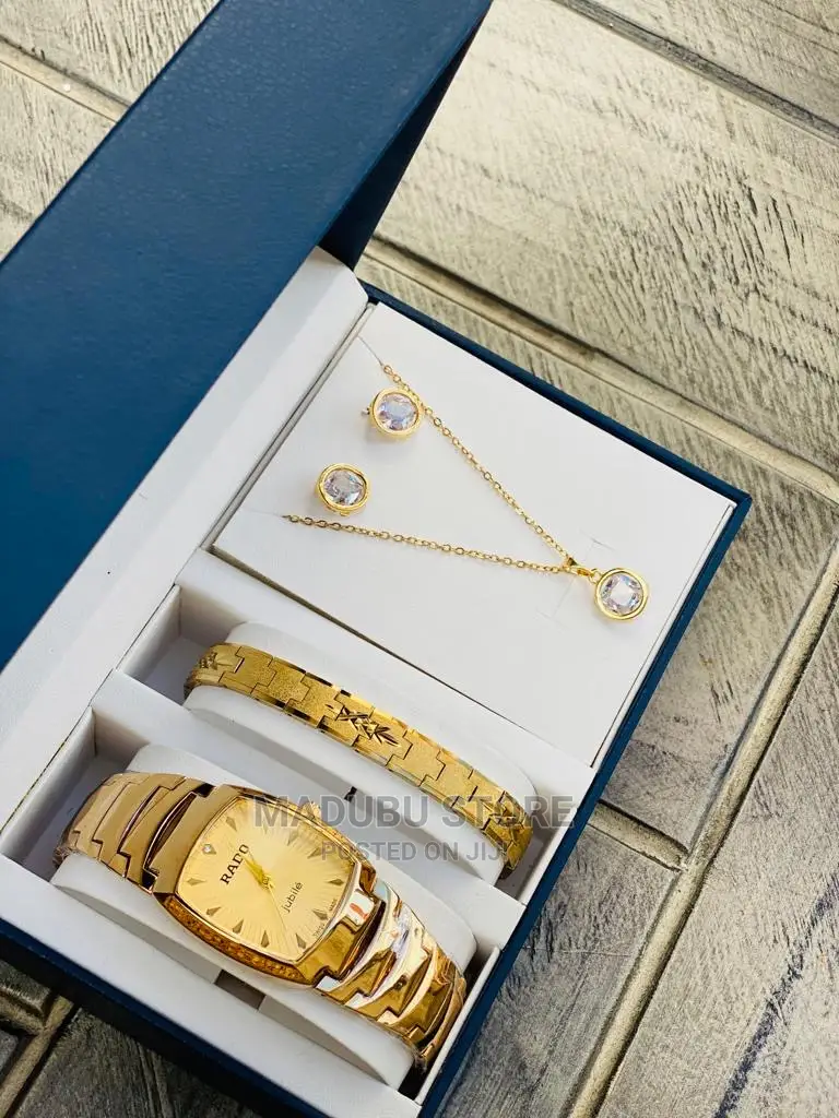 A Set of Watch, Bracelet, Earrings and Necklace