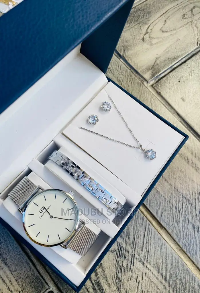 A Set of Watch, Bracelet, Earrings and Necklace