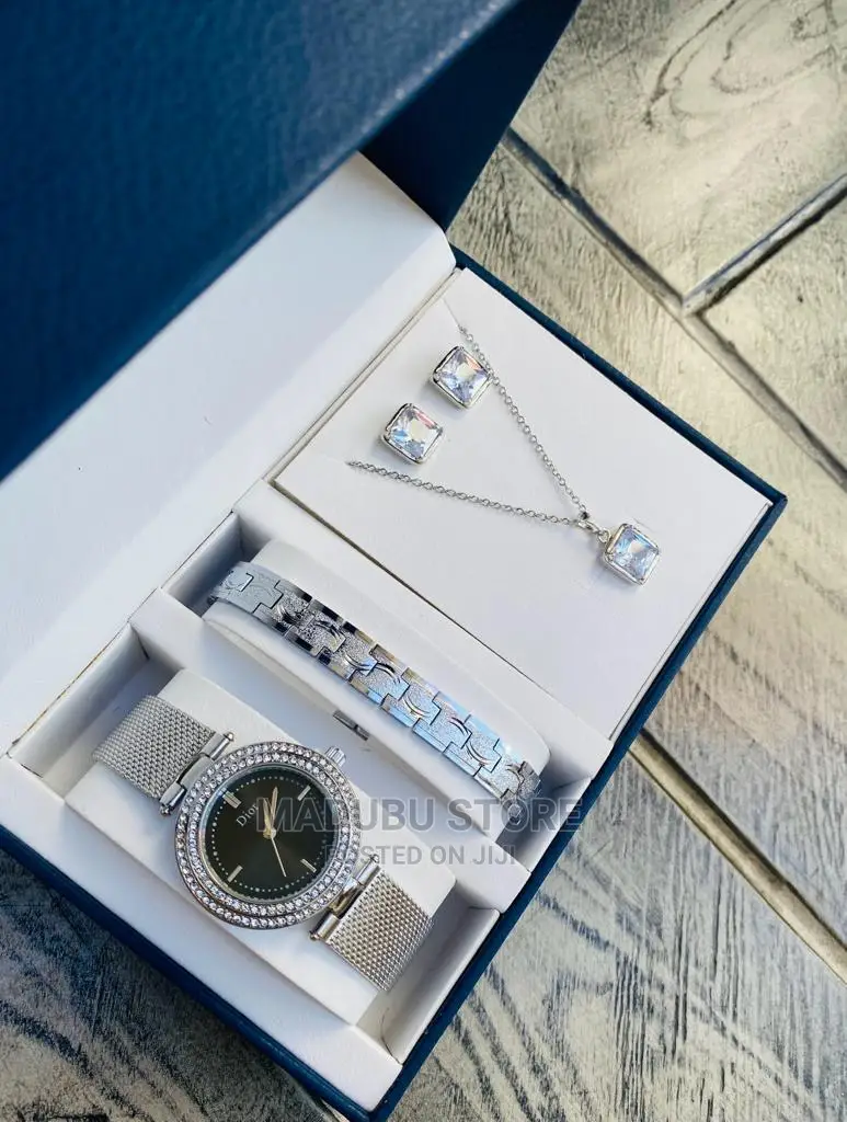 A Set of Watch, Bracelet, Earrings and Necklace