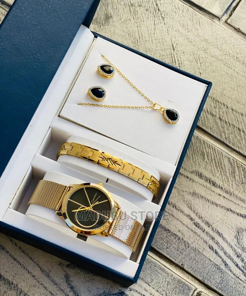A Set of Watch, Bracelet, Earrings and Necklace