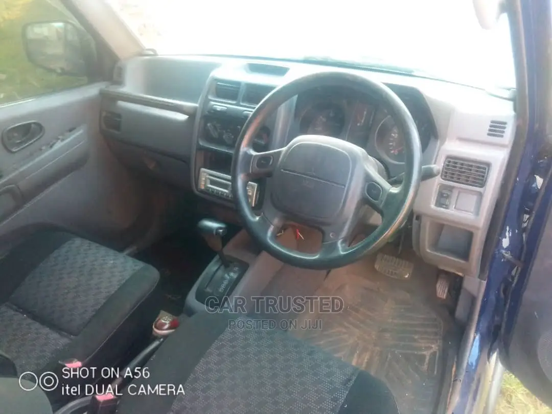 Mitsubishi Pajero Junior 2000 Beige