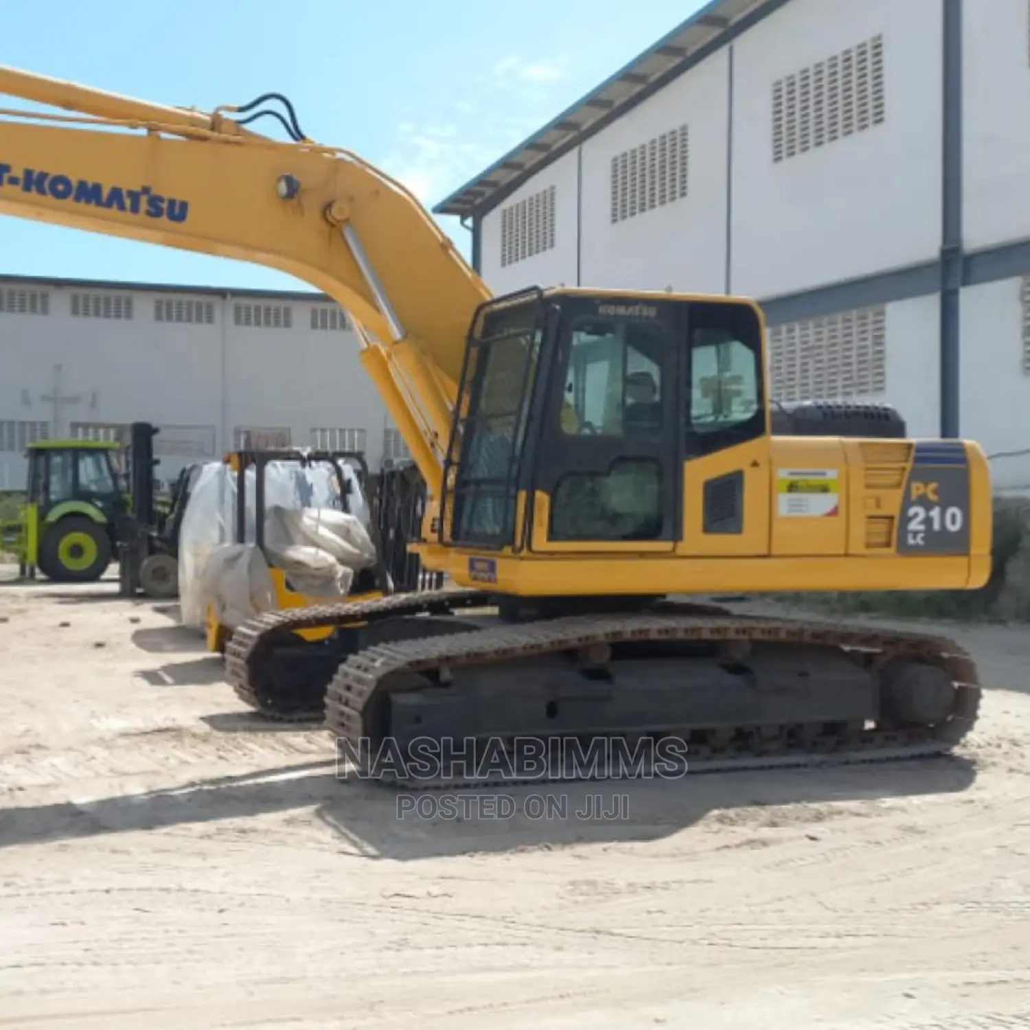 L T Komatsu 210 LC Excavator 2pcs
