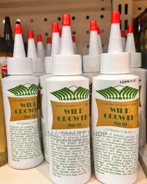 WILD GROWTH Hair Oil .