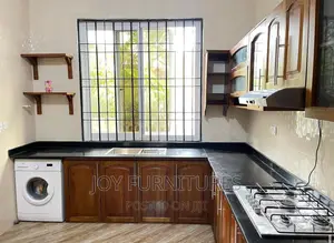 Kitchen Cabinets (Mninga)