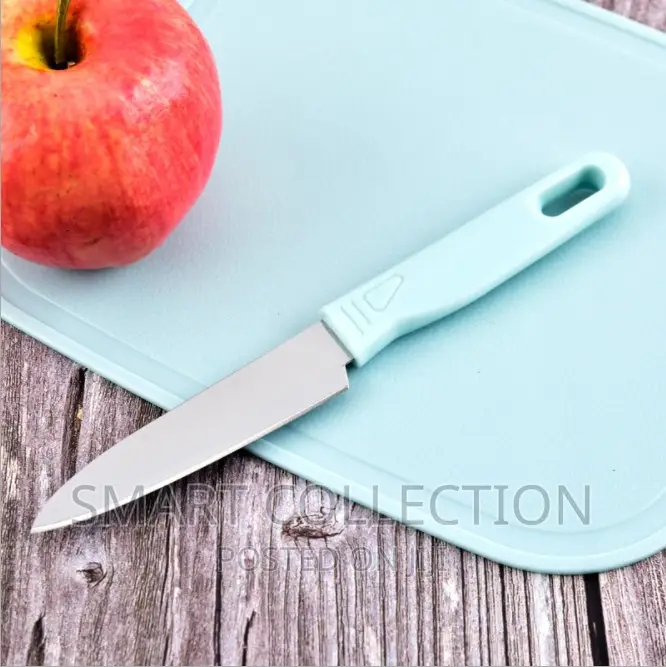 A Set Of Chopping Board,Knife, Scissors Peeler