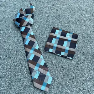 Tai Na Kitambaa Chake | Tie and Pocket Square