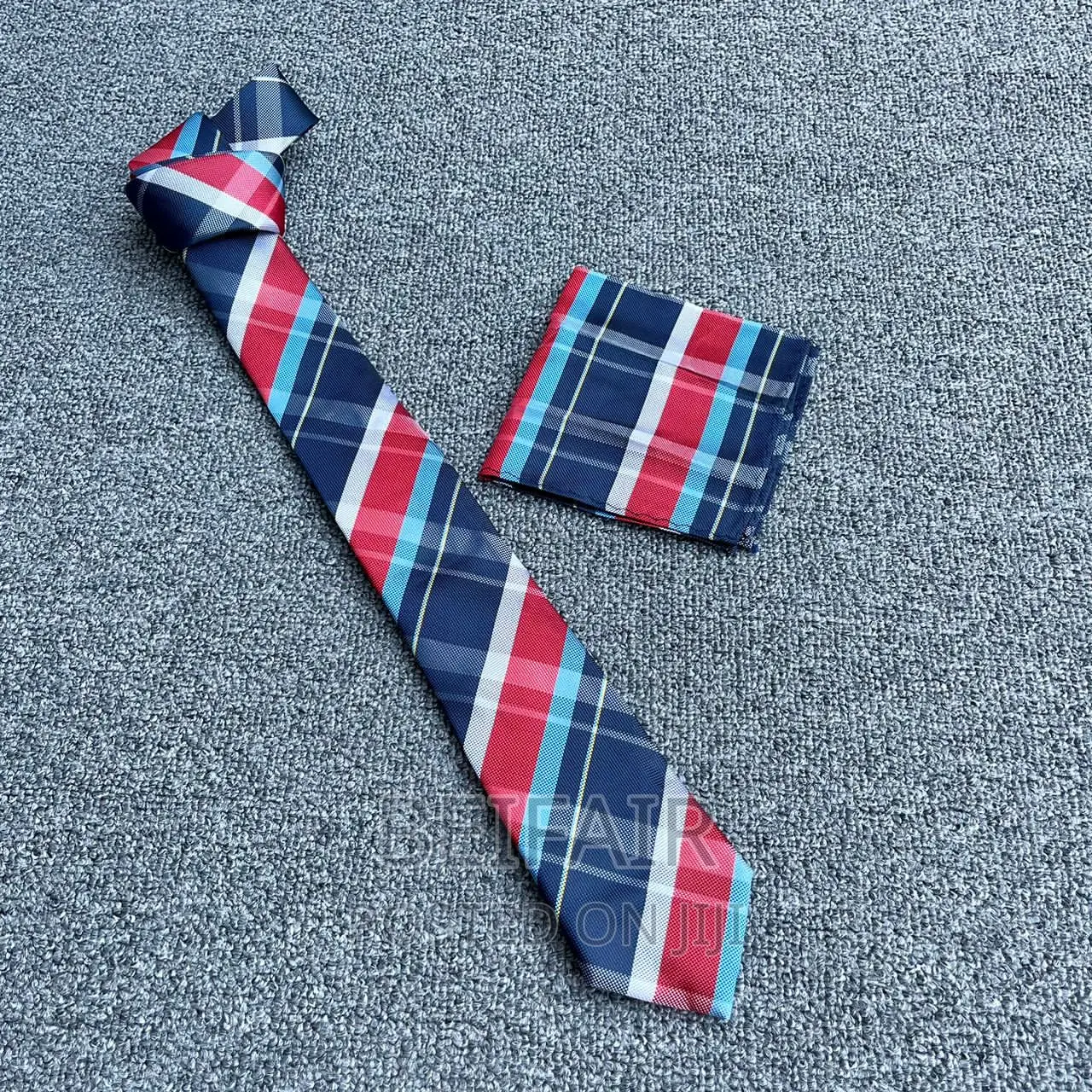 Tai Na Kitambaa Chake | Tie and Pocket Square