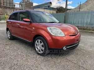 Mazda Verisa 2009 Red