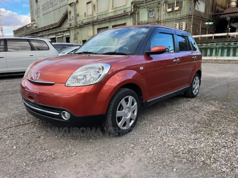 Mazda Verisa 2009 Red