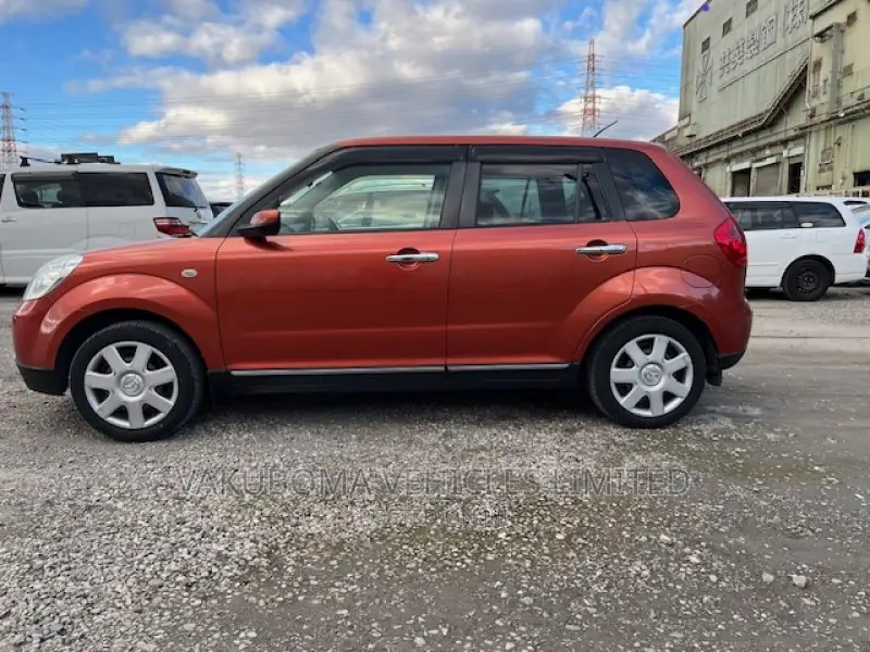 Mazda Verisa 2009 Red