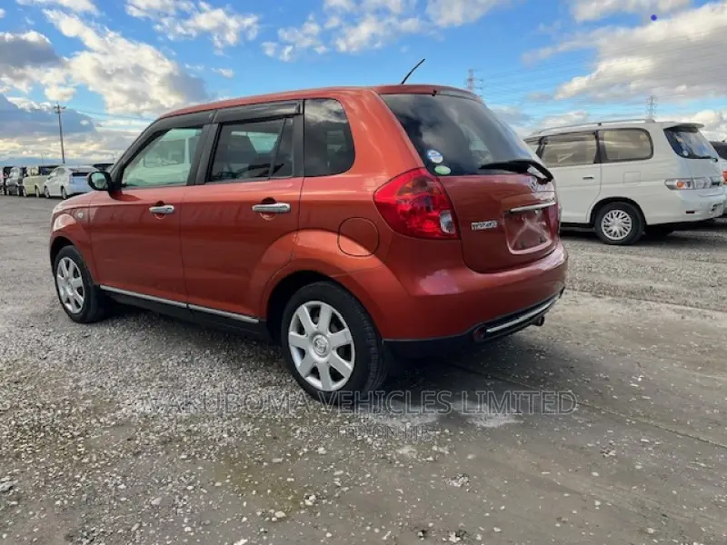 Mazda Verisa 2009 Red