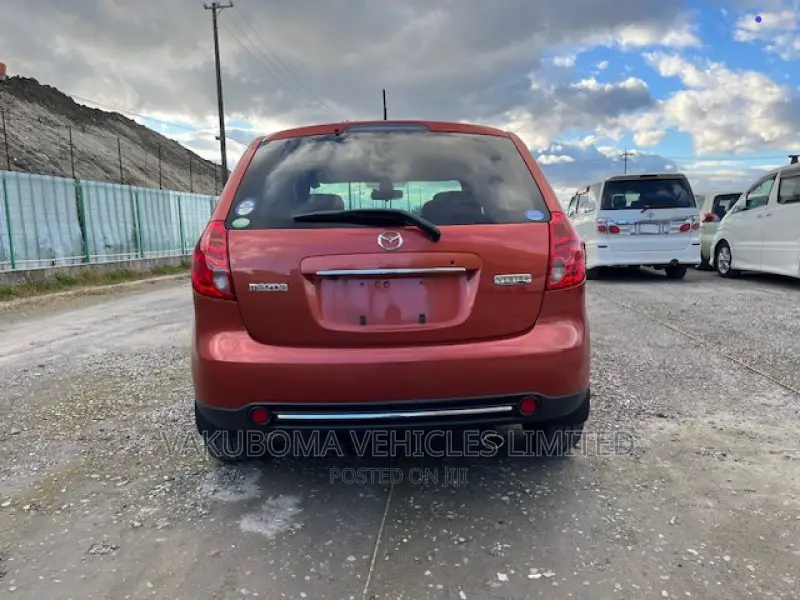 Mazda Verisa 2009 Red