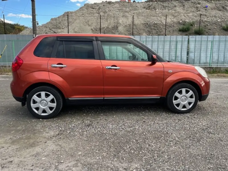 Mazda Verisa 2009 Red