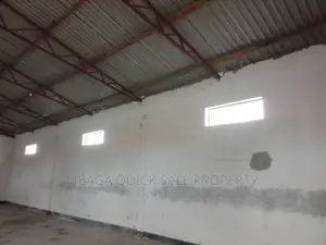 Yard With 12 Shop Frem at Mbagala