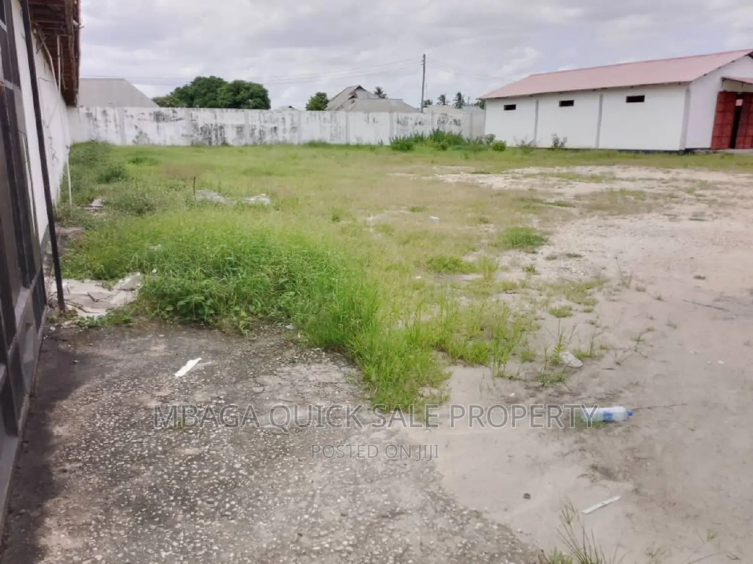 Yard With 12 Shop Frem at Mbagala