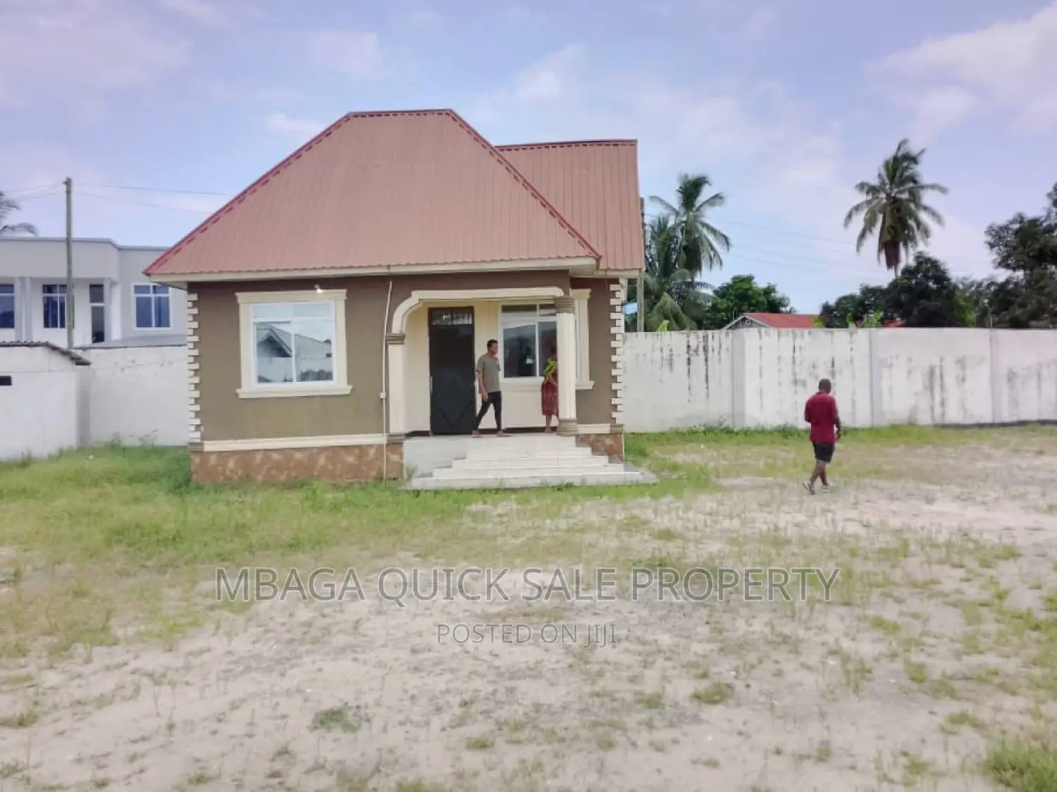 Yard With 12 Shop Frem at Mbagala