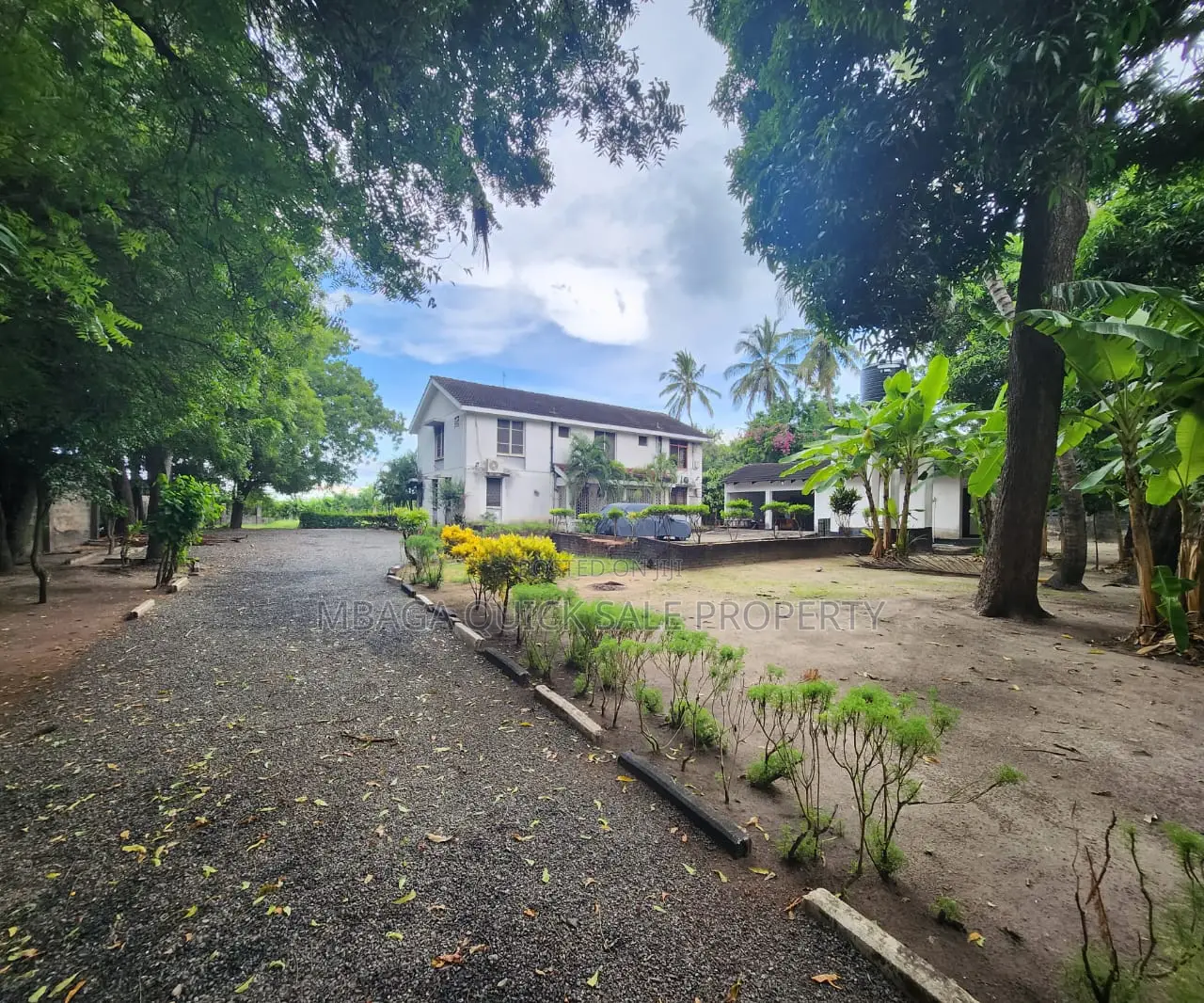 Plot for Sale at Mbezi Beach With House Inside