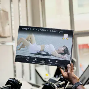 Photo - Back Stretcher Device Bed, Chair, Car Muscle Pain Relief