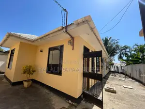Loge Yenye Vyumba 12 Inauzwa Ipo Tegeta Wazo Kisanga