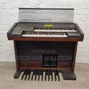 Photo - Brand New Yamaha Piano El 90