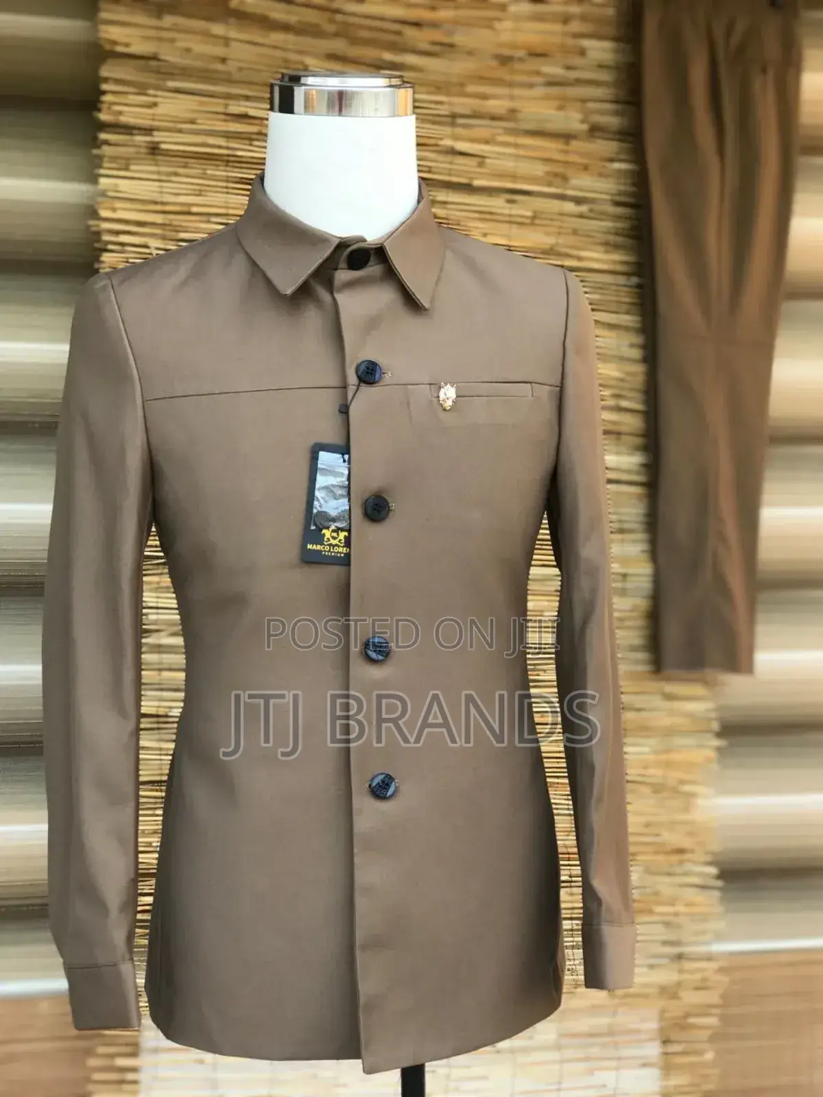 Kaunda Suits Zisizo Na Mawaa