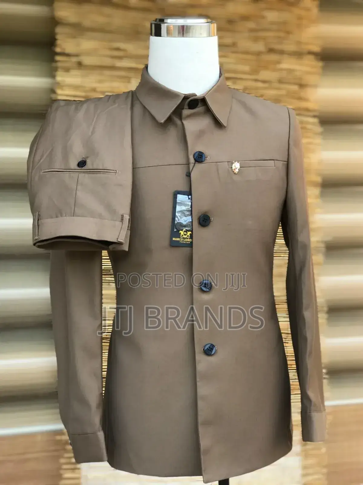 Kaunda Suits Zisizo Na Mawaa