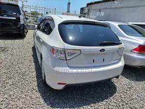 Photo - Subaru Impreza 2.5i Premium Sedan 2010 White