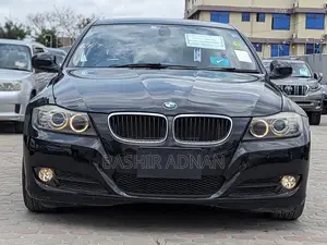 Photo - BMW 3 Series 320i RWD 2010 Matt Black