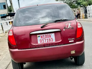 Toyota Duet 1999 Burgundy
