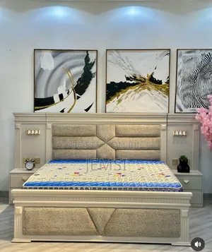 Bed With Two Bedsides and Lamps