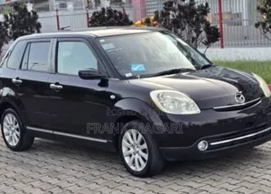 Mazda Verisa 2009 Burgundy