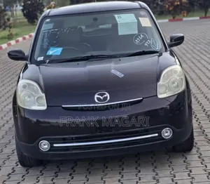 Mazda Verisa 2009 Burgundy