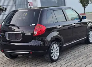 Mazda Verisa 2009 Burgundy