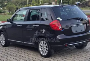 Mazda Verisa 2009 Burgundy