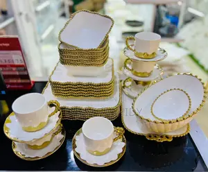 Unique Dinnerset Gold and White 