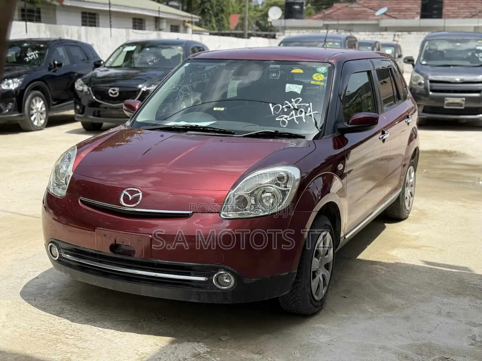 Mazda Verisa 2010 Burgundy
