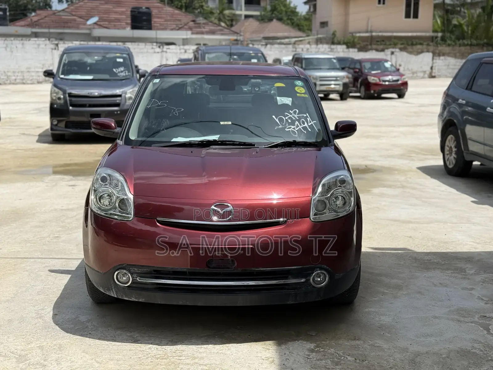 Mazda Verisa 2010 Burgundy