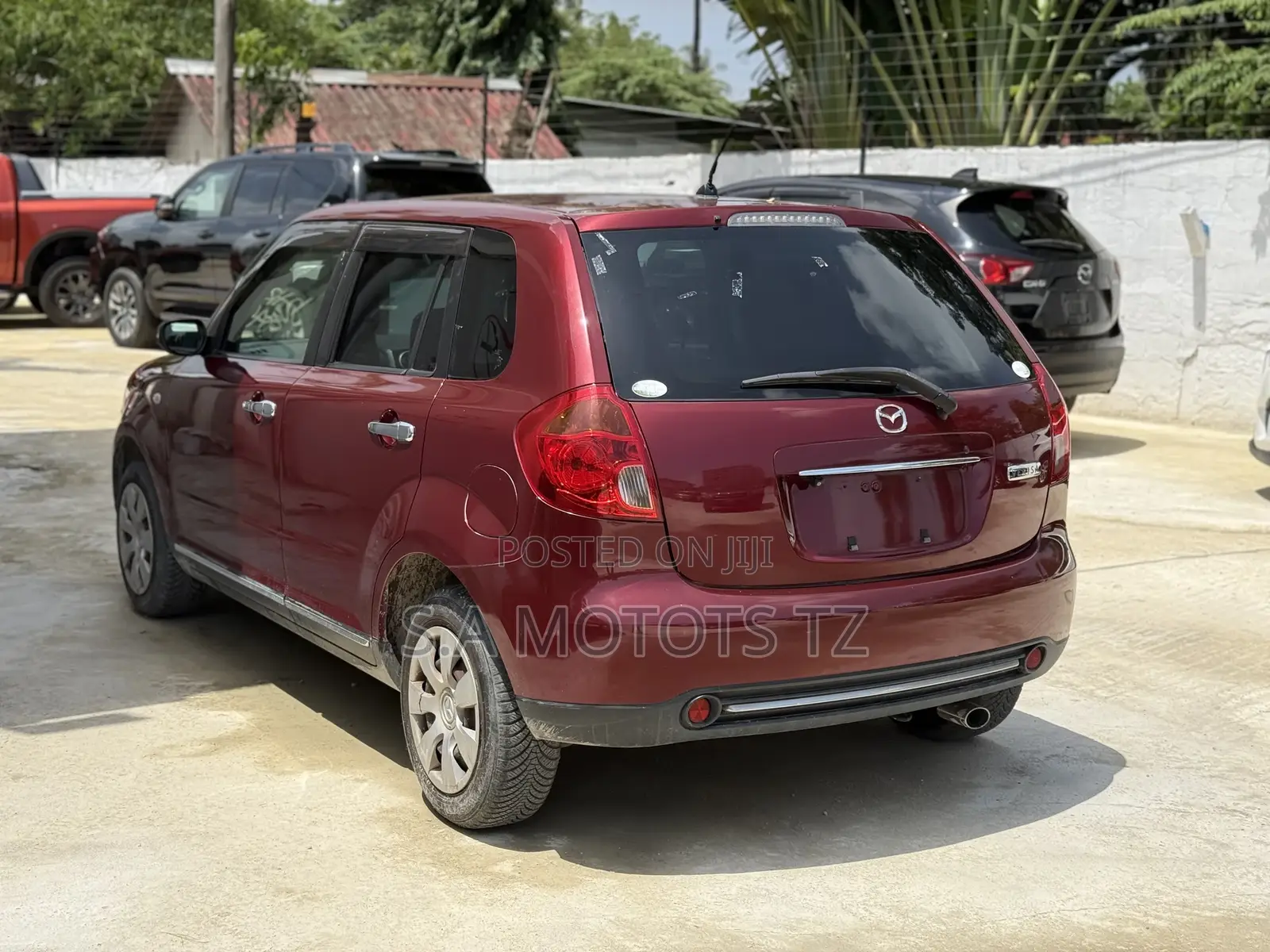 Mazda Verisa 2010 Burgundy
