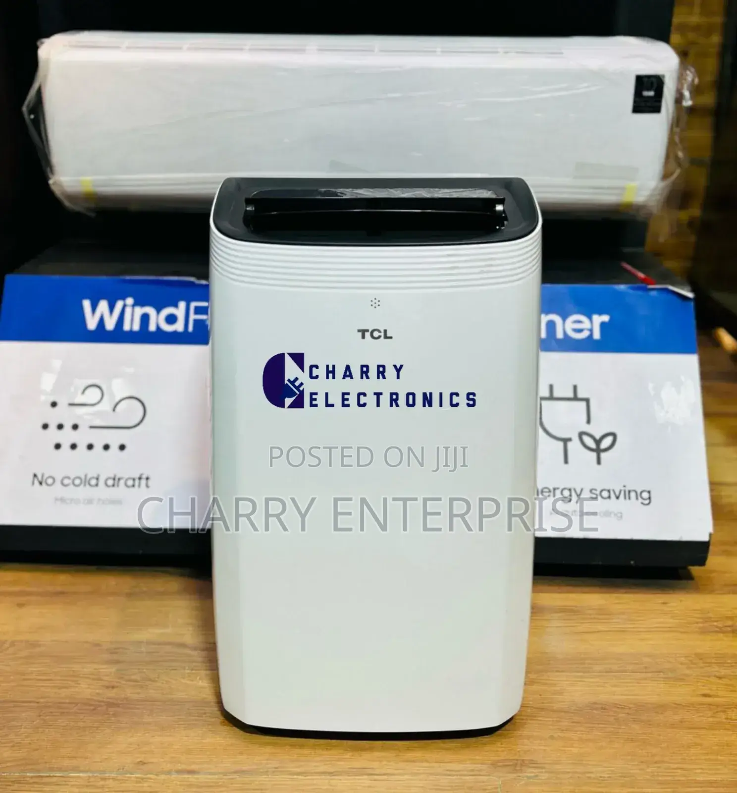 *Tcl Portable Ac 
 12,000 BTU Enjoy Good Surrounding Air
