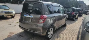 Toyota Ractis 2010 Beige
