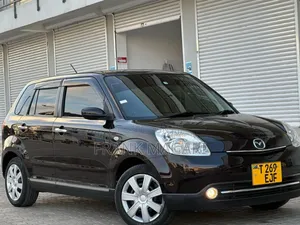 Mazda Verisa 2009 Burgundy